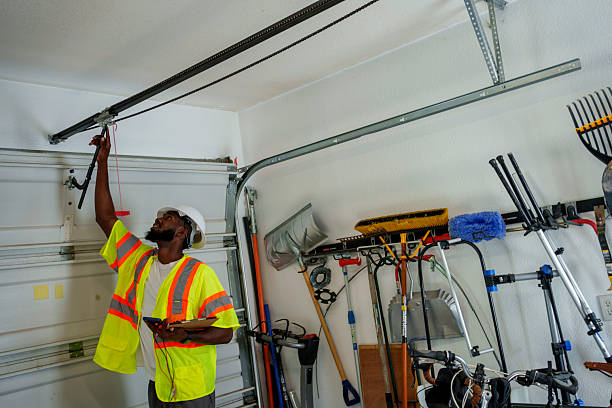 Professional Garage Door Panel Replacement technician working in Summit County County, OH